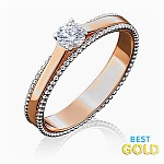 Помолвочное кольцо из комбинированного золота c фианитом